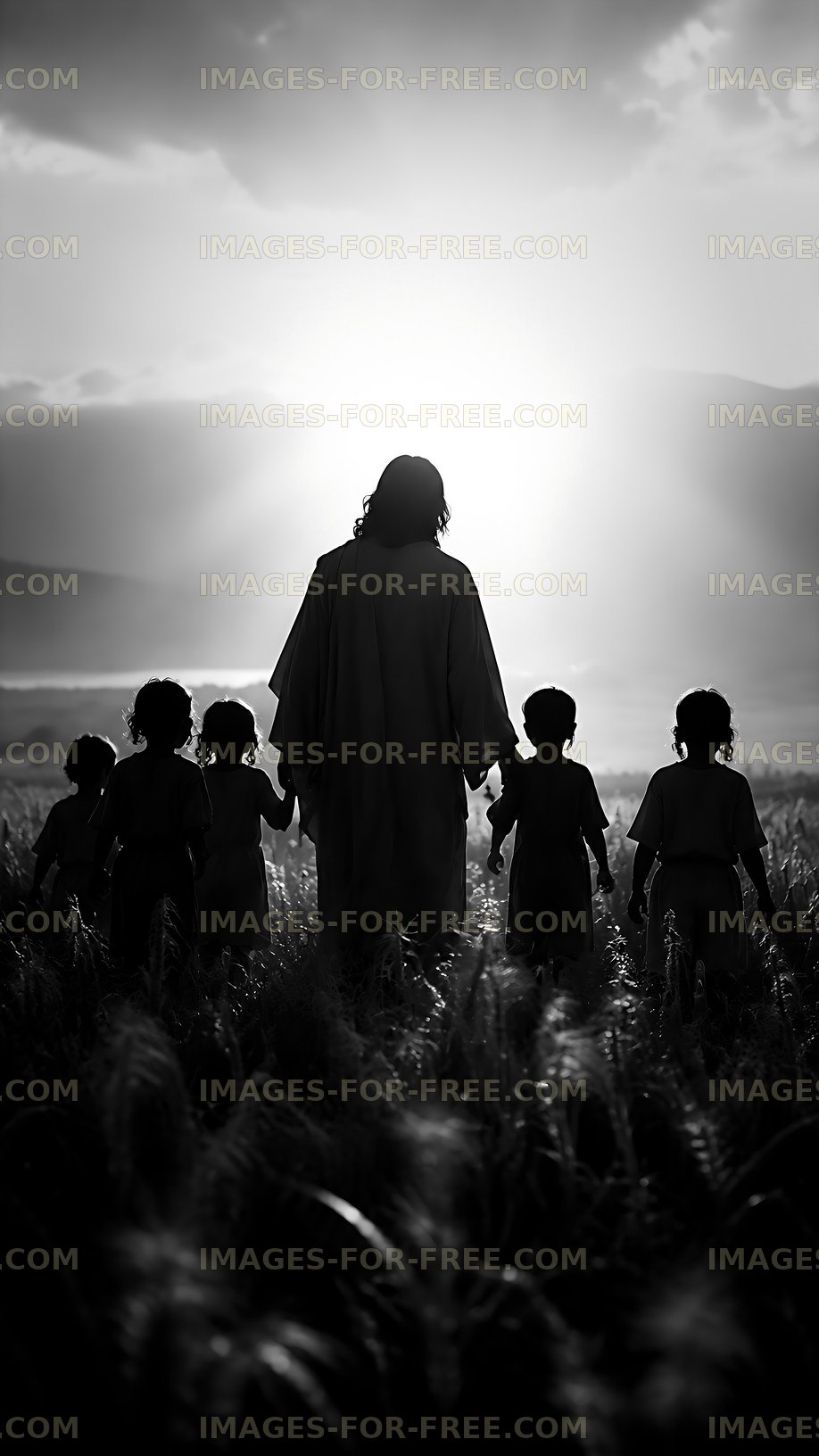 Figures walking in a wheat field at sunset