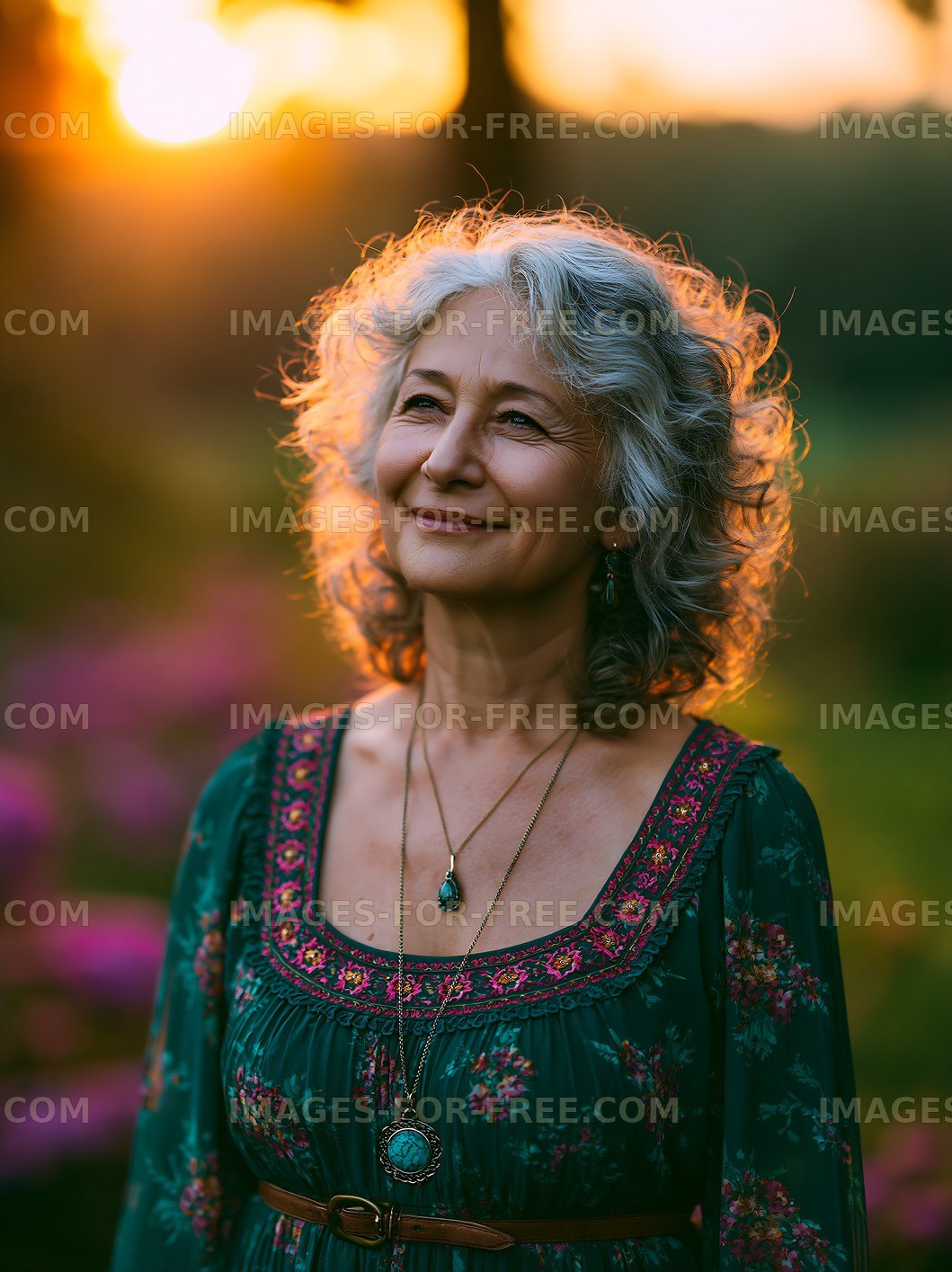 Woman smiling during sunset in a floral dress