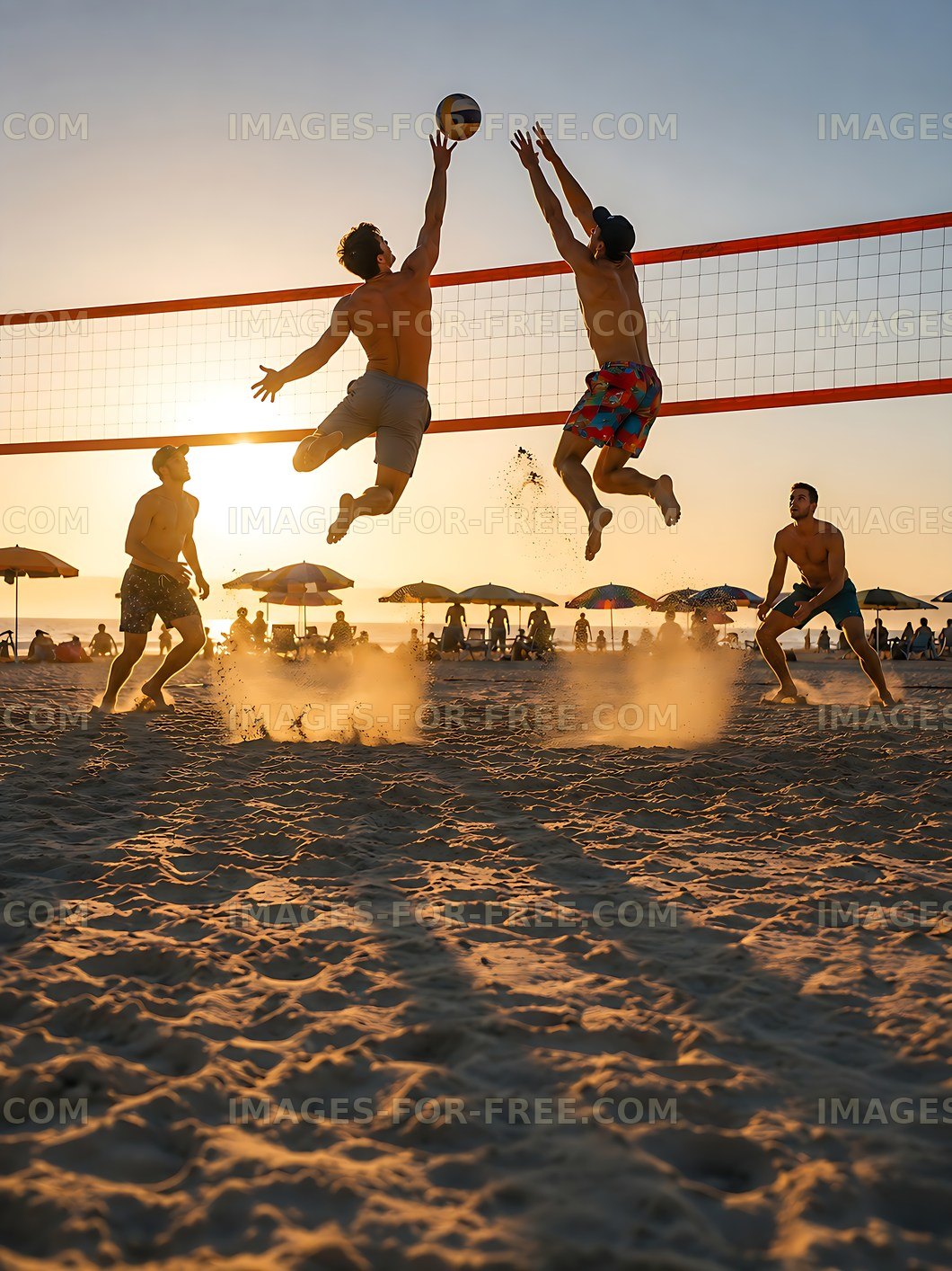 Men playing beach volleyball during sunset at the coast