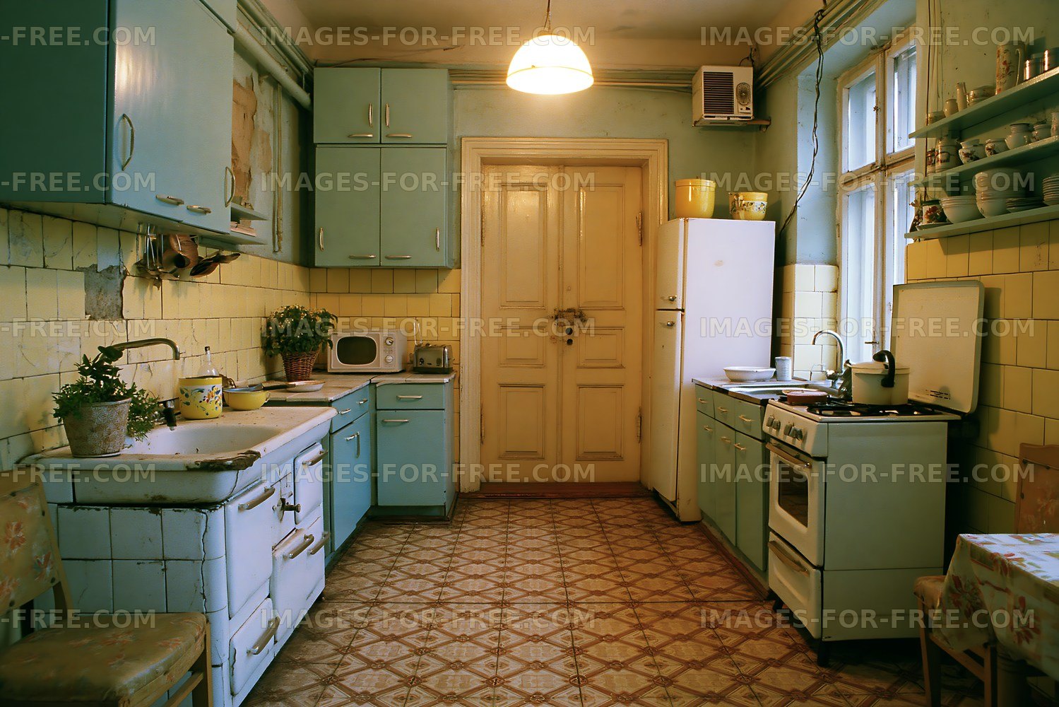 Vintage kitchen with blue cabinets and tiled floor