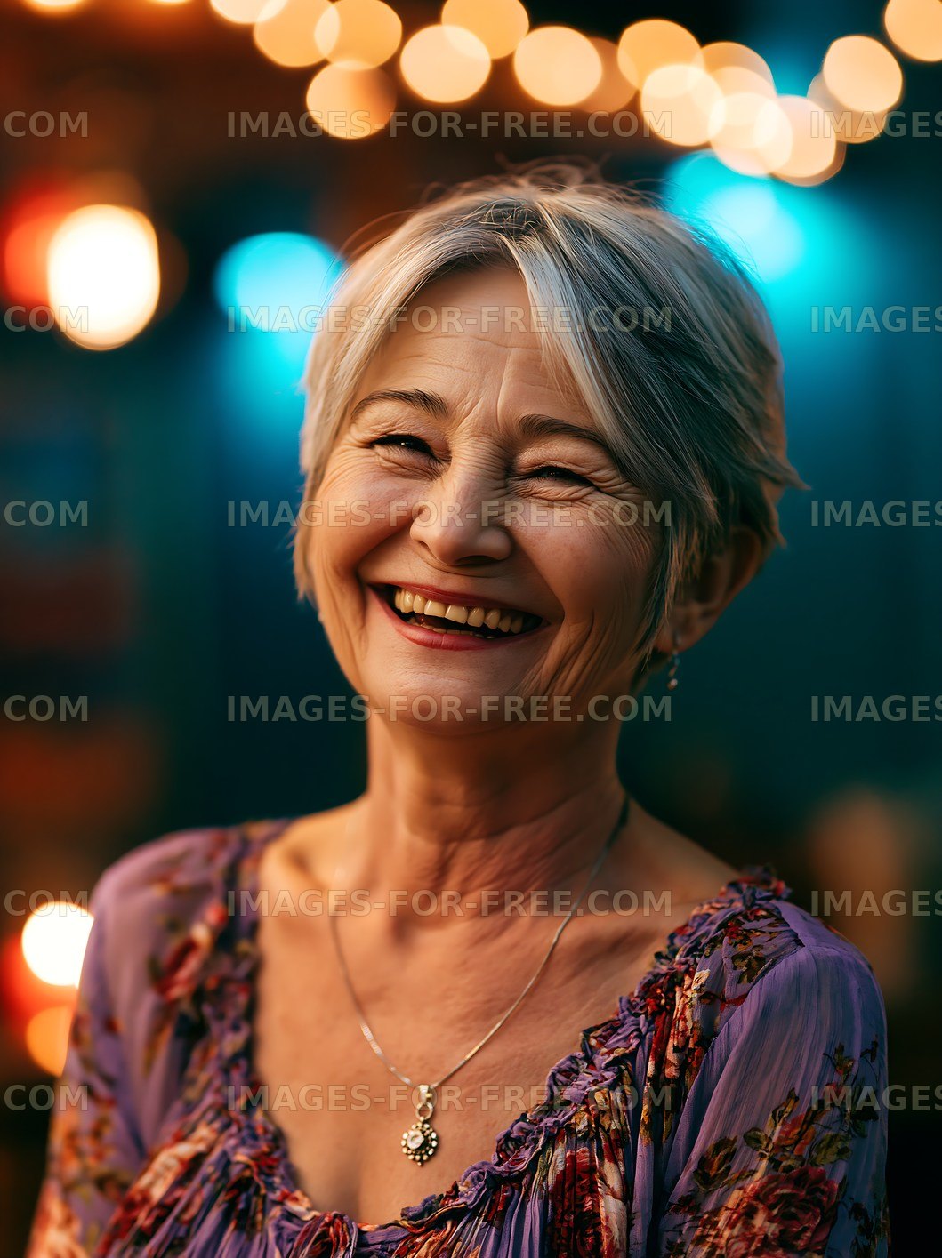 Smiling woman with short gray hair in festive setting