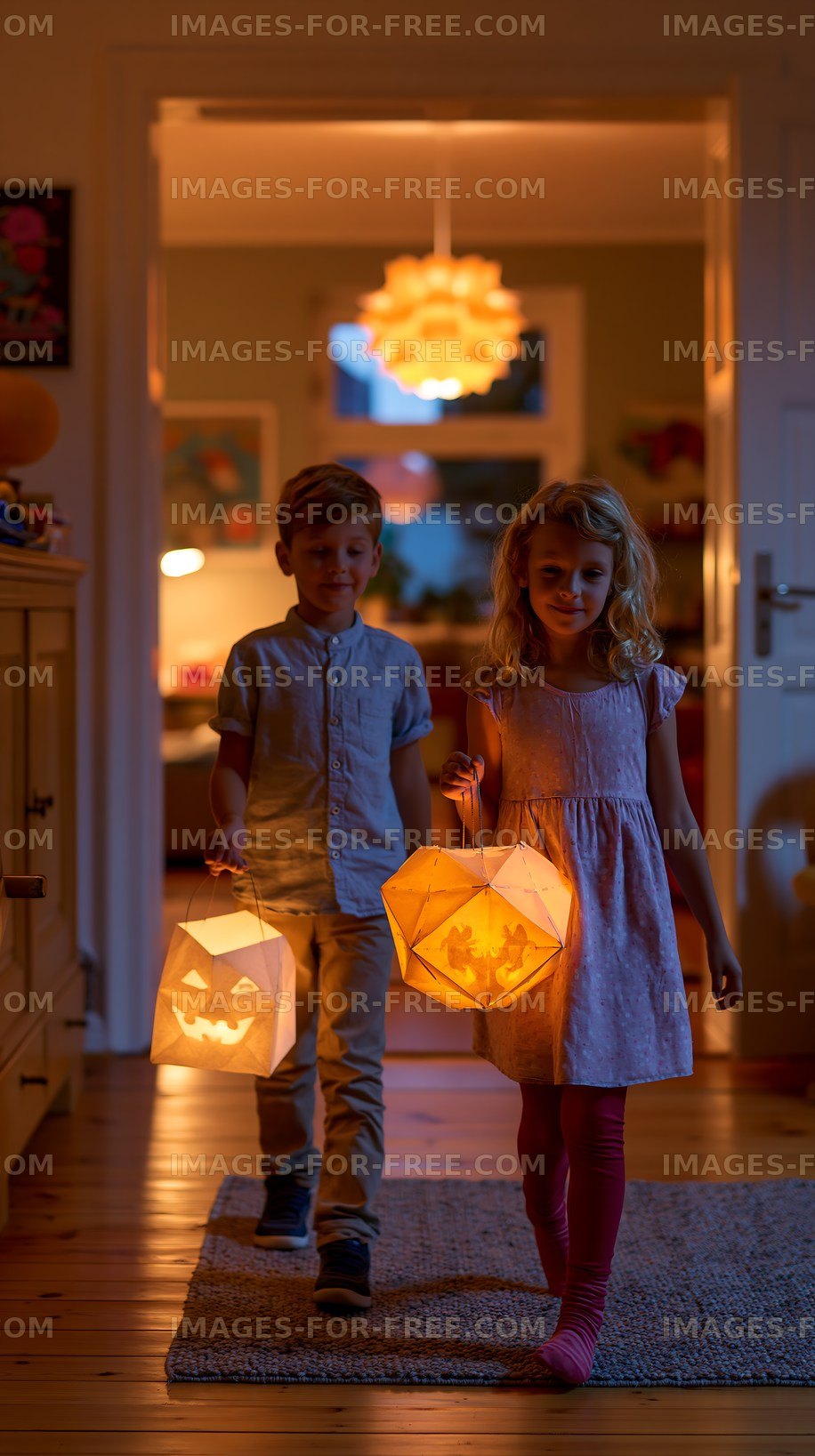 Children carrying Halloween lanterns during evening walk
