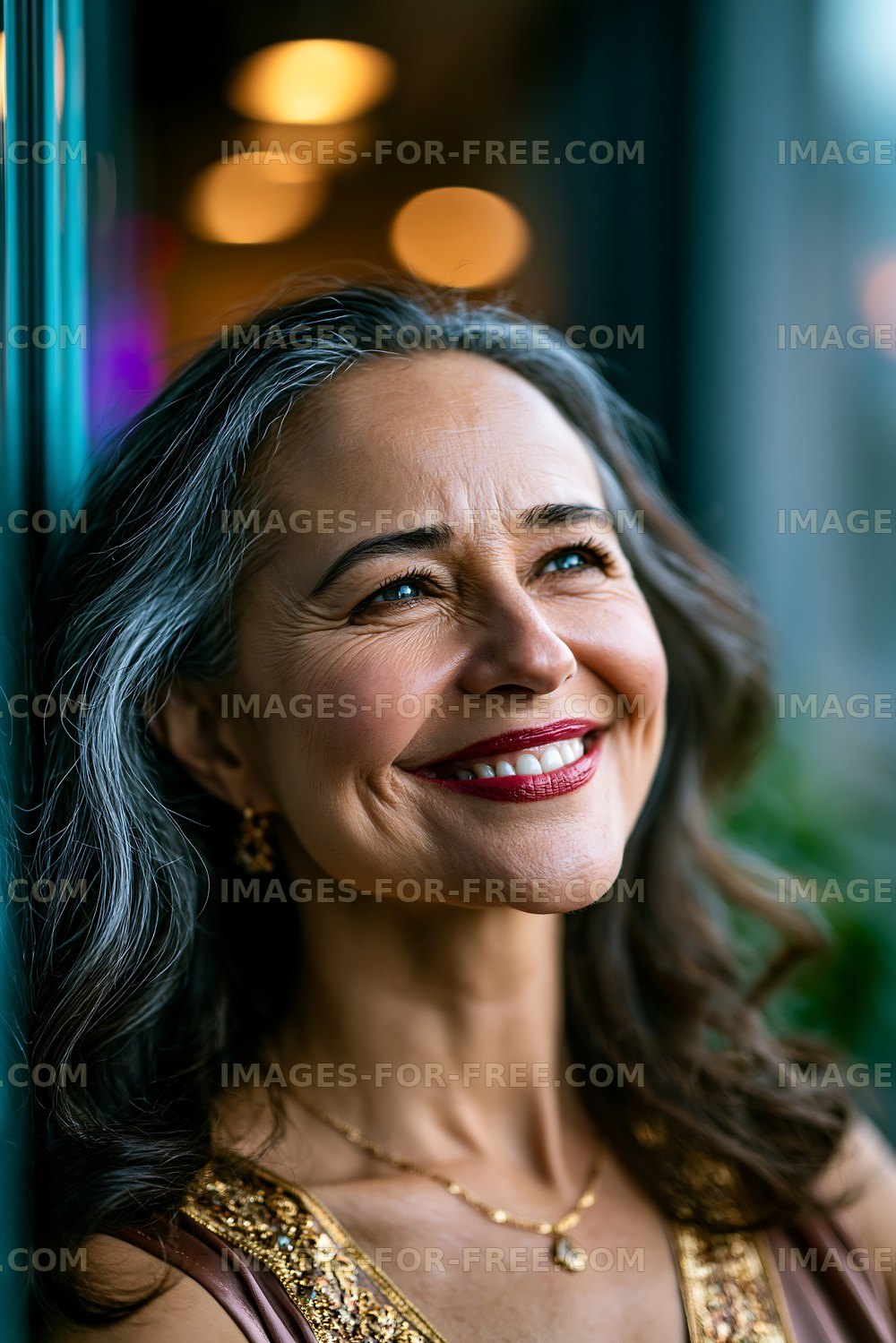 Smiling woman with gray hair enjoying her time indoors