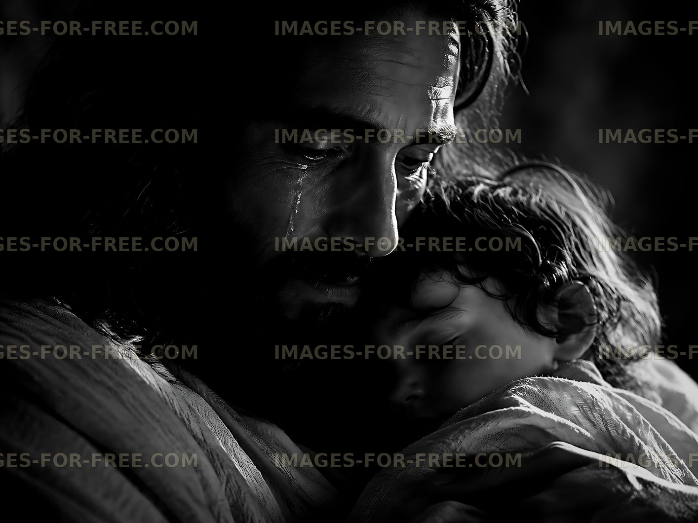Father holding child in dark background