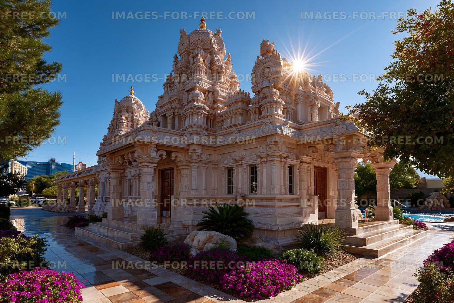 Hindu temple with intricate stone carvings in sunny weather
