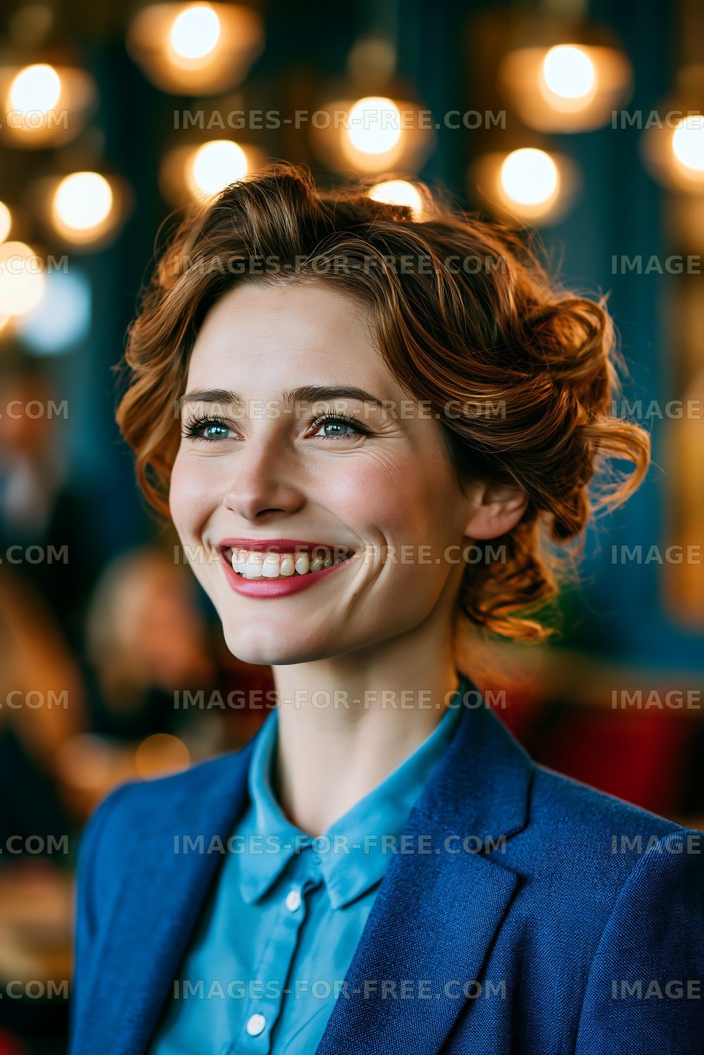 Woman smiling in a cafe with warm lights in the background