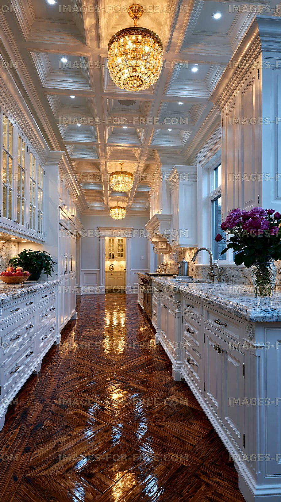 Modern kitchen with white cabinets and chandeliers