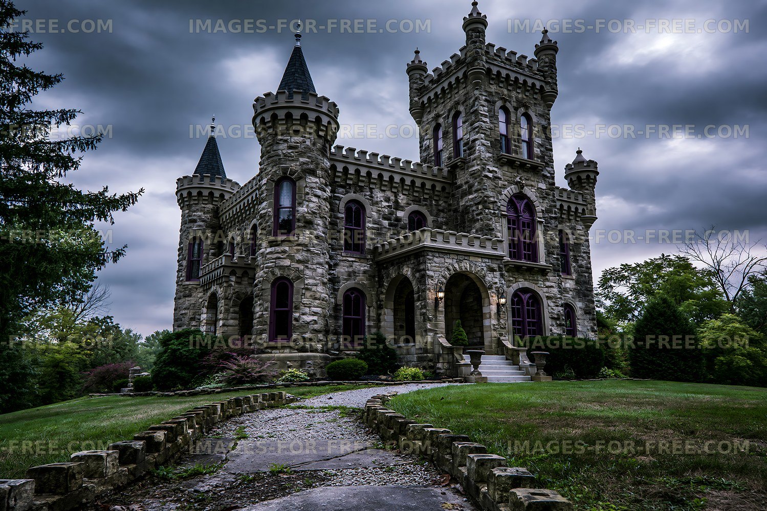 Old stone castle with turrets under a cloudy sky