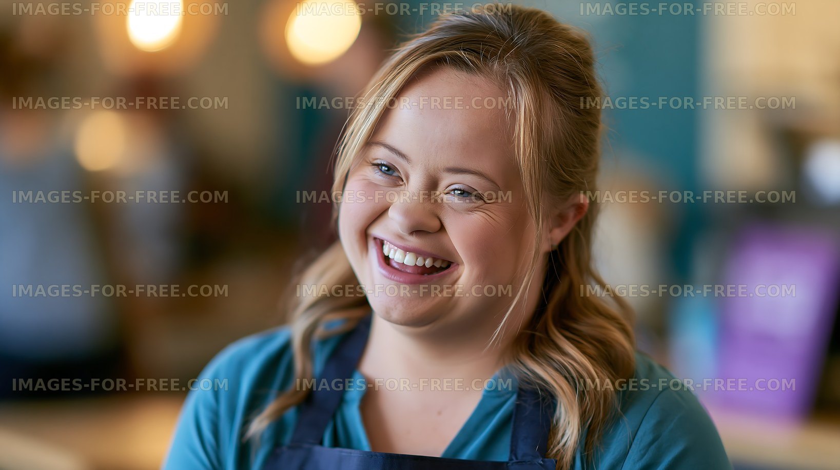 Smiling young woman in blue shirt and apron at a café