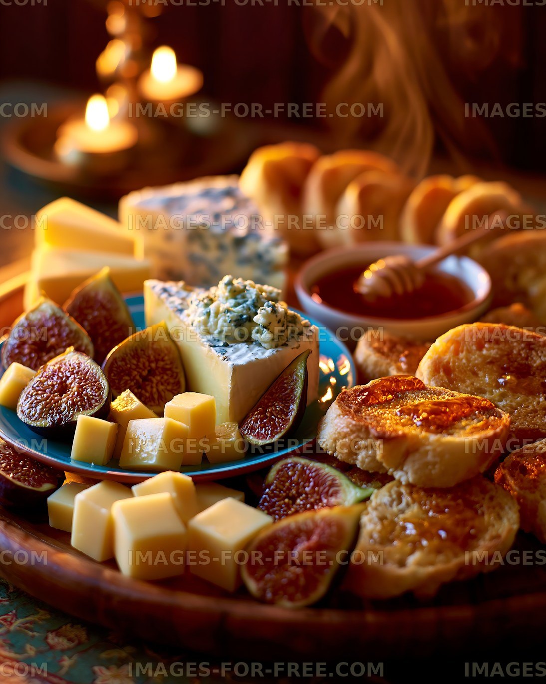Cheese platter with figs and bread arranged on wooden table