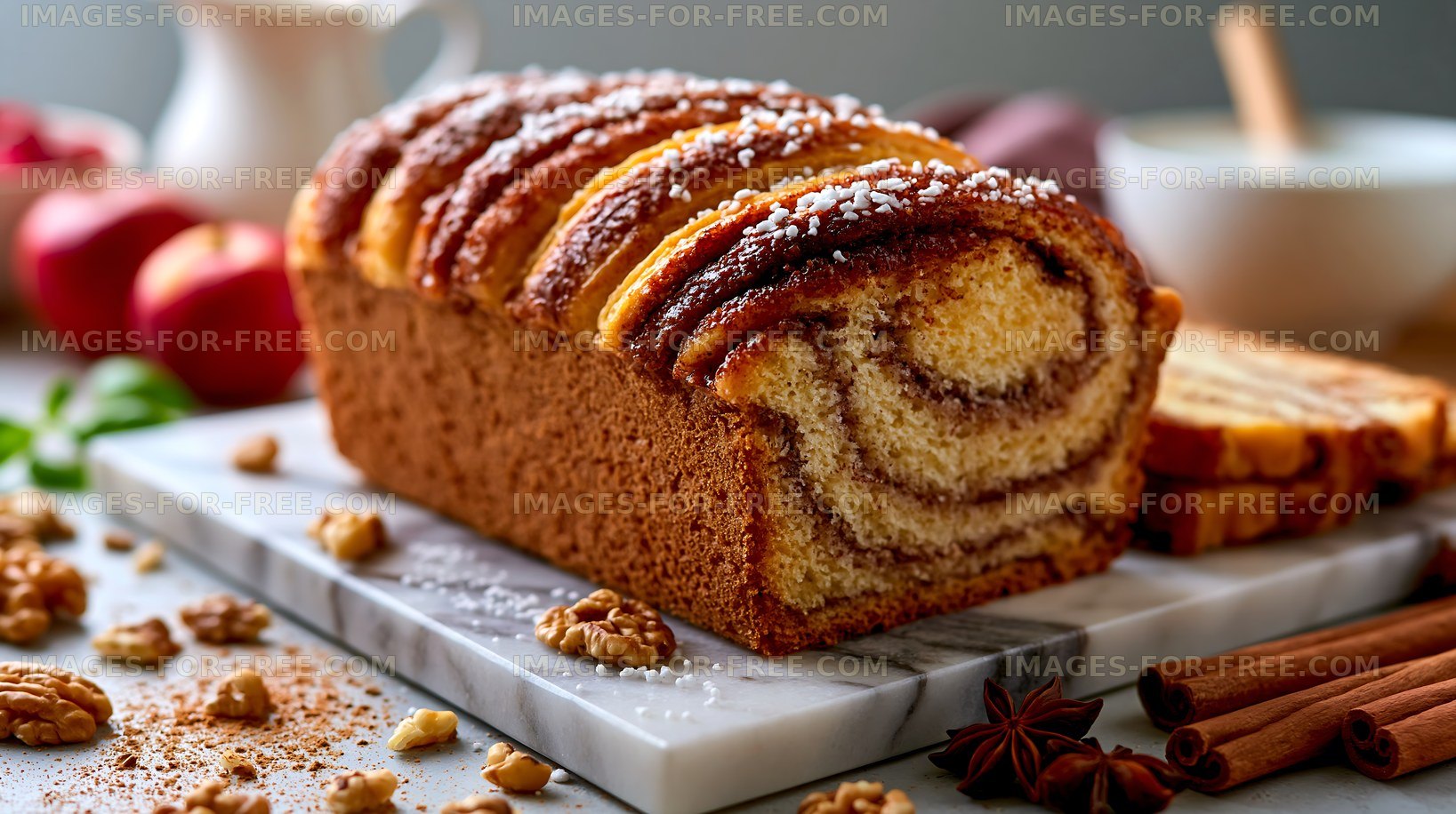 Cinnamon swirl bread loaf on a marble cutting board