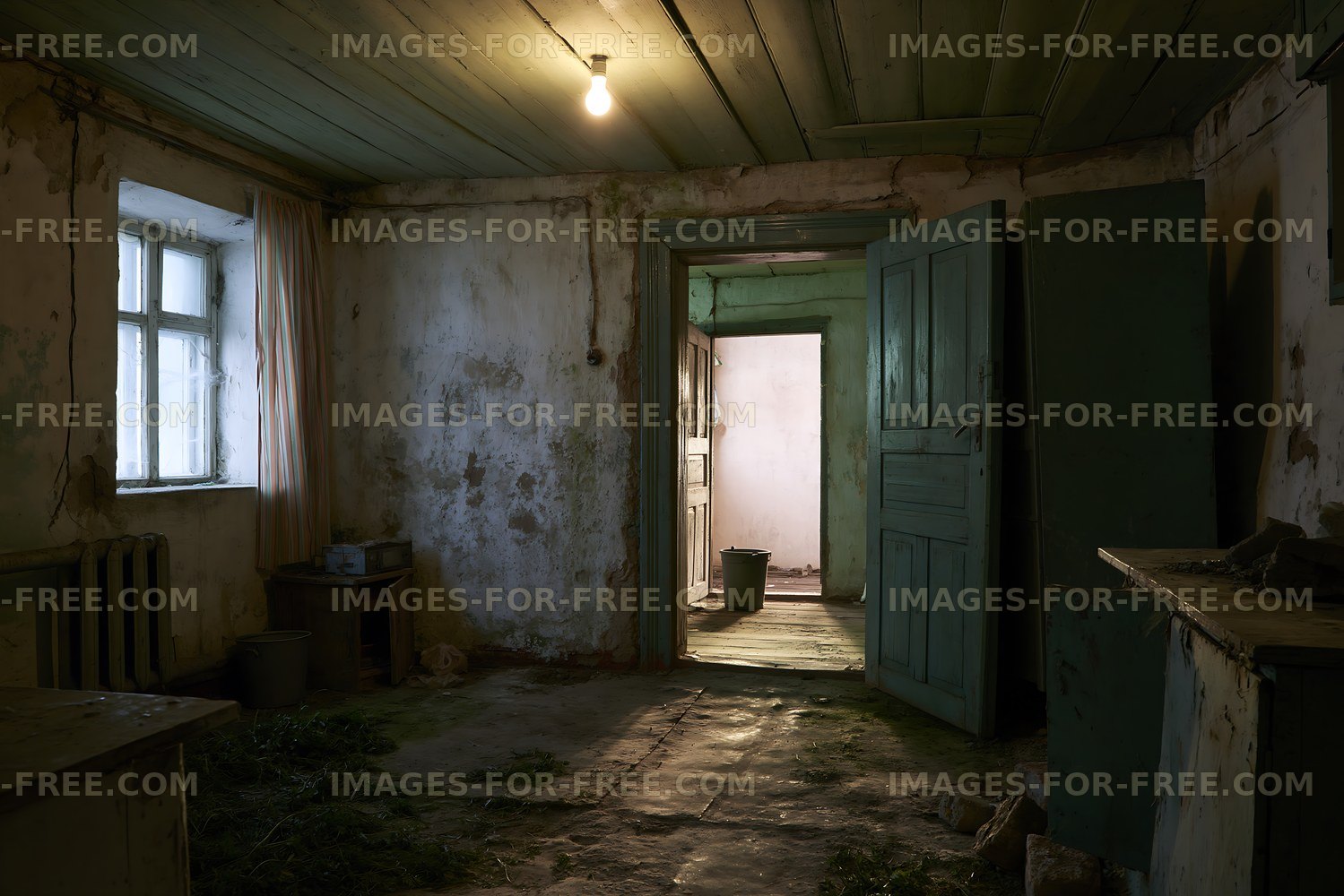 Abandoned room with simple furnishings and light bulb