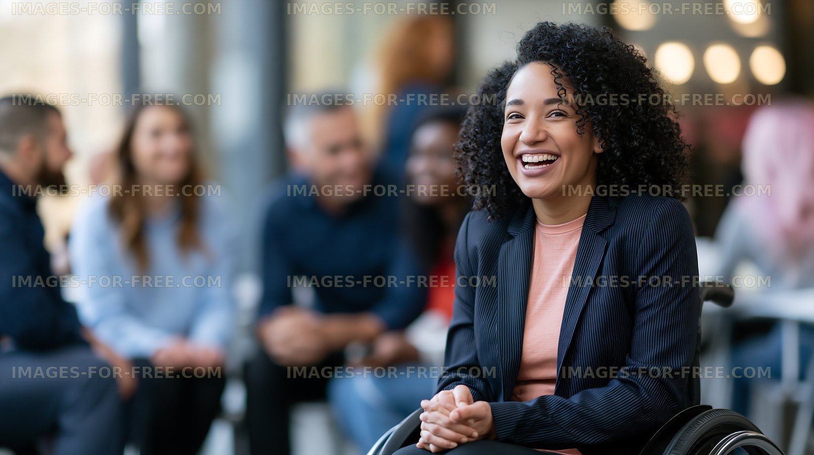 Woman in wheelchair smiles during a group discussion