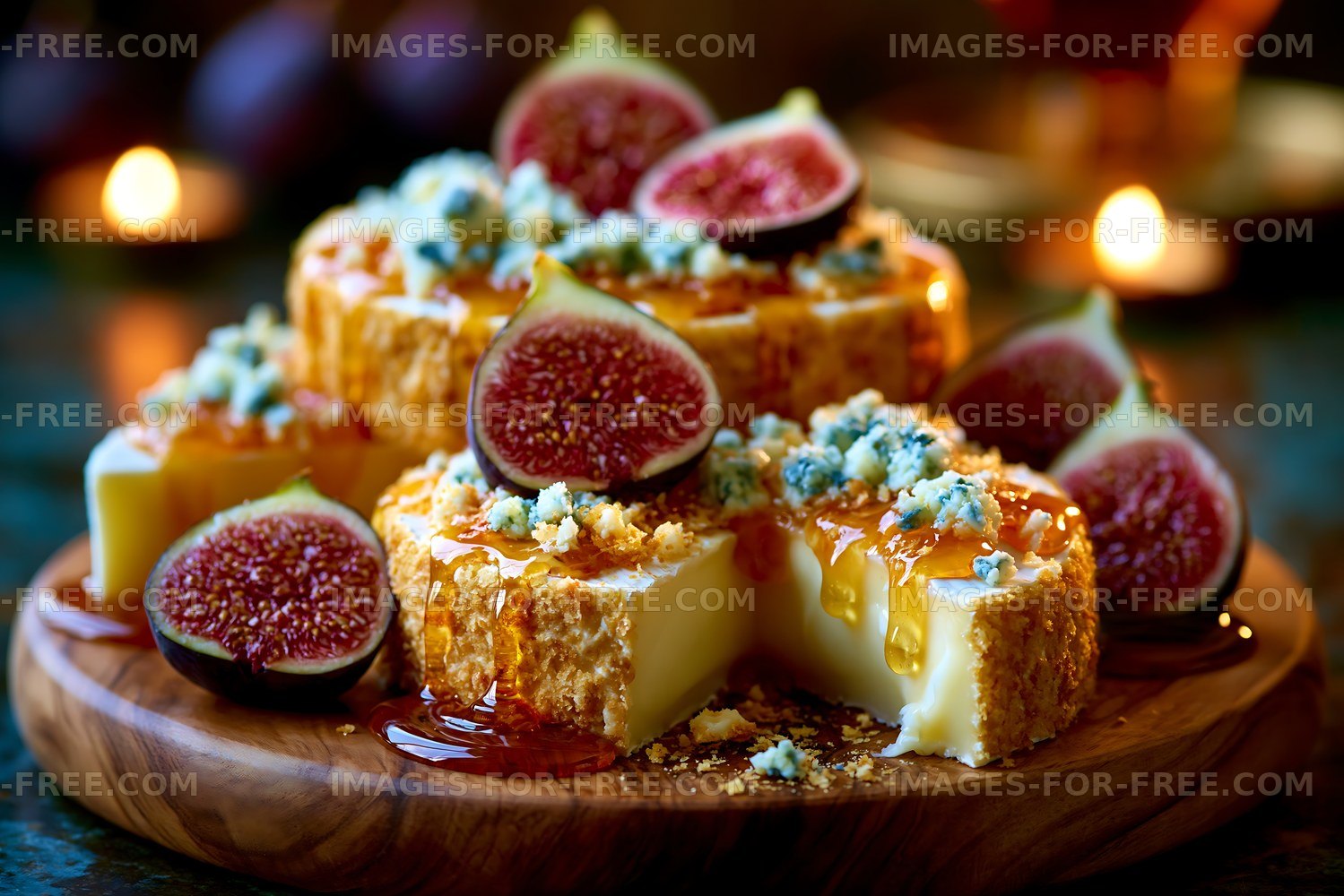 Cheese and fig platter with honey on a wooden board