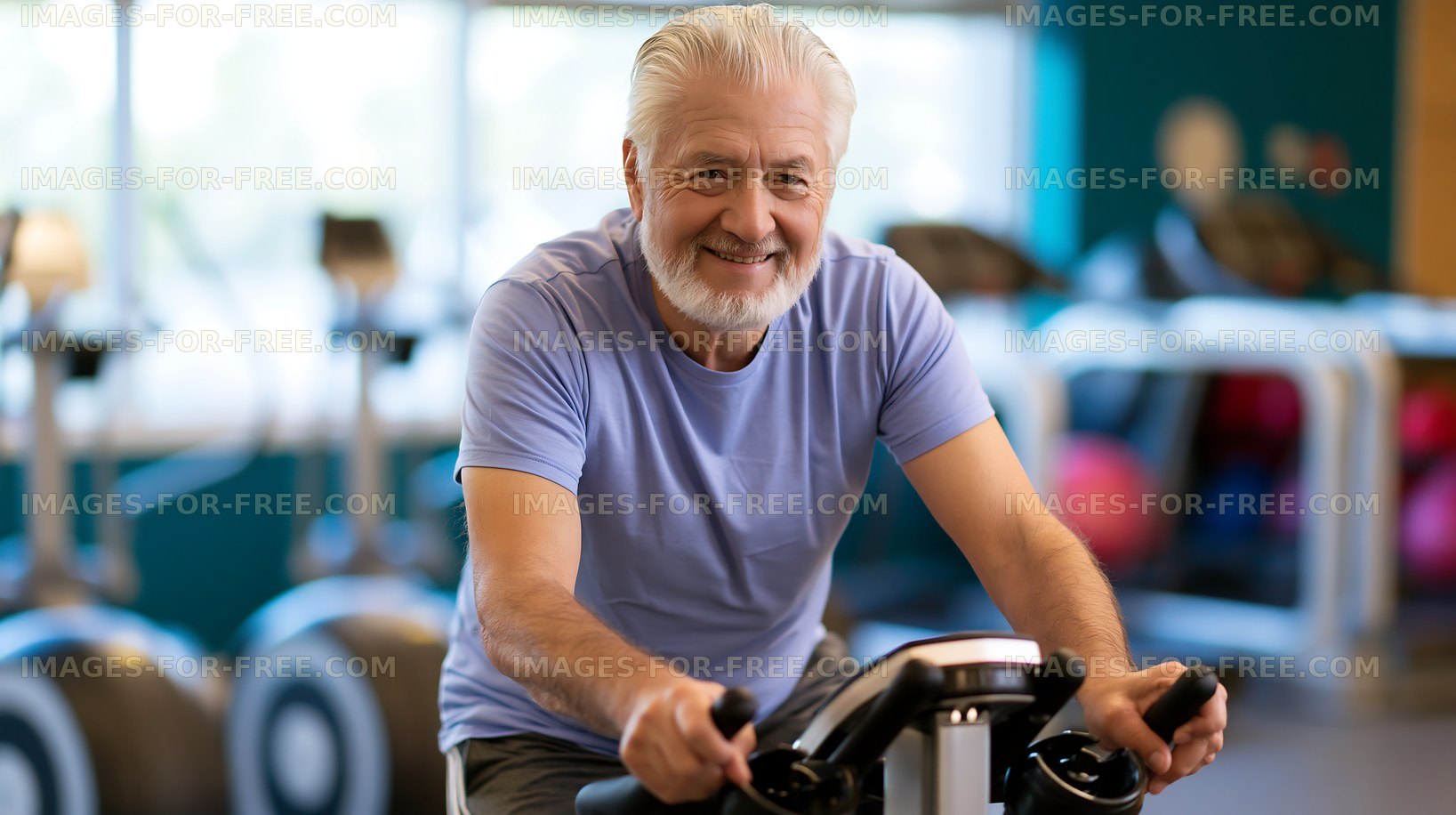 Senior man exercising on stationary bike at gym