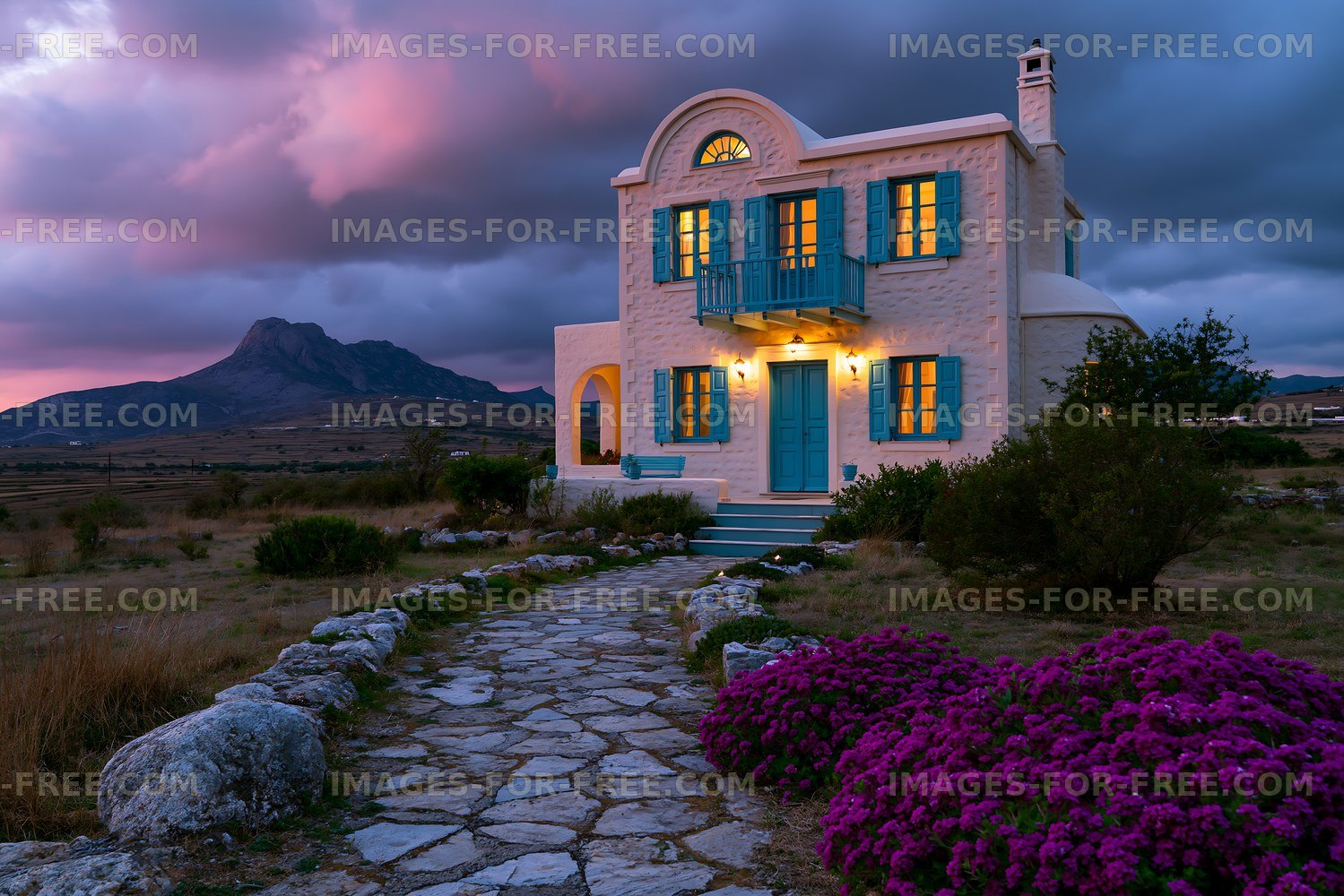 Charming house with blue shutters near mountain landscape
