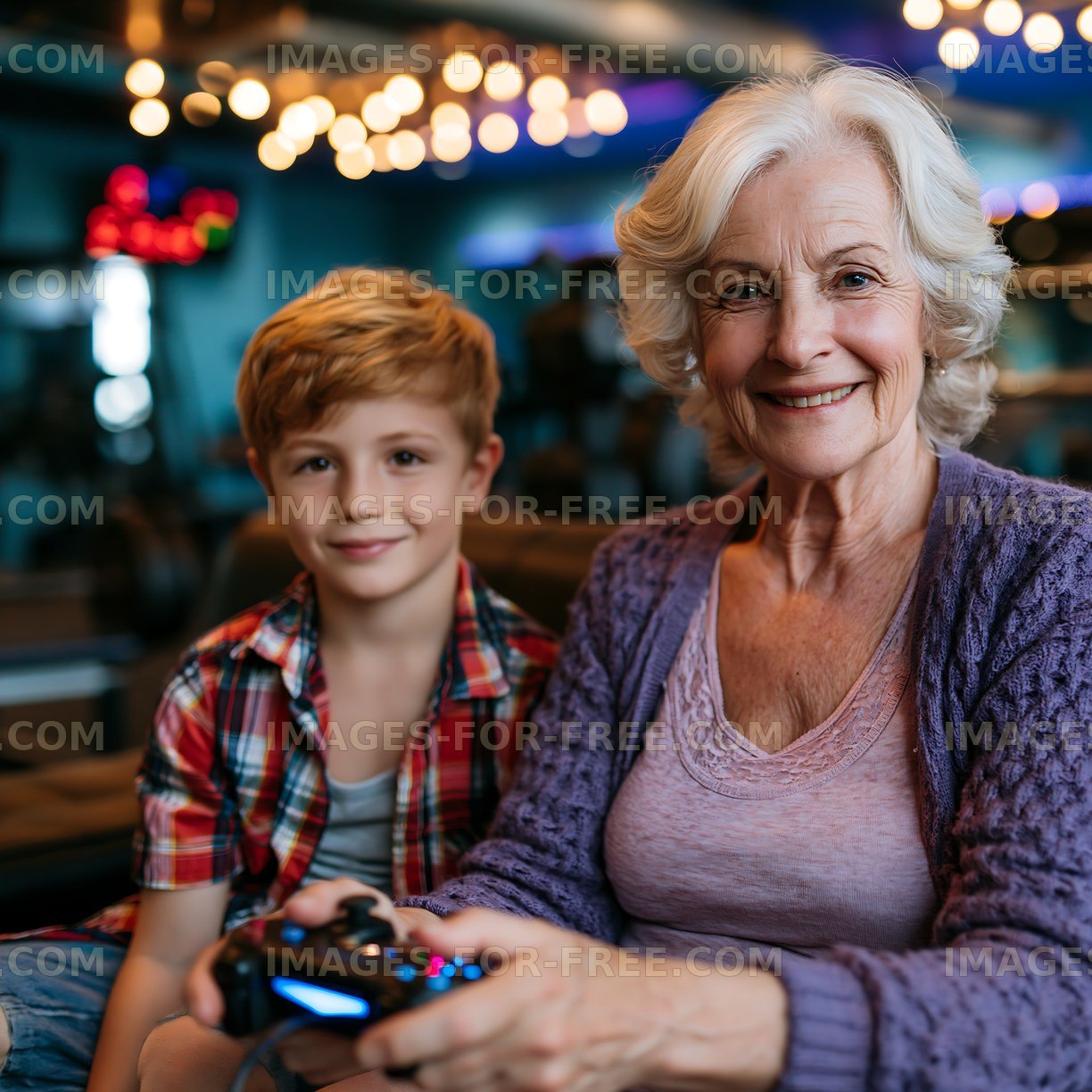 Grandmother and grandson play video games together indoors