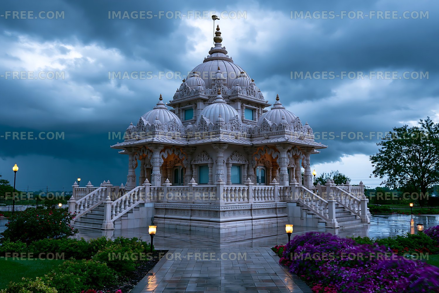 Hindu temple structure under a cloudy sky with rain