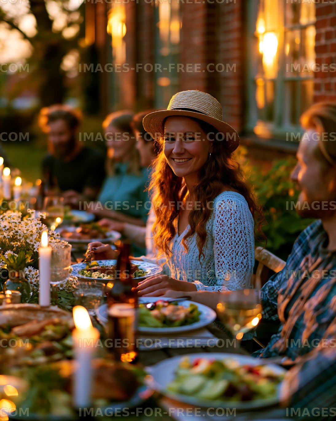 Gathering at sunset with friends around a table of food
