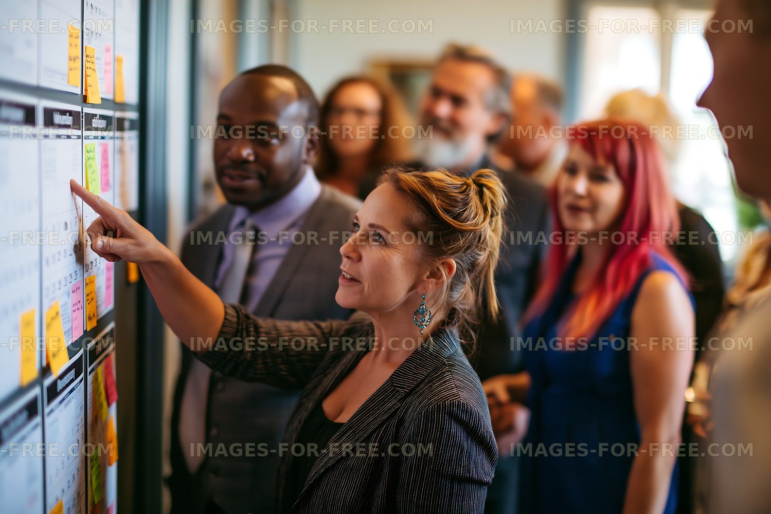 Group of people discussing ideas in an office environment
