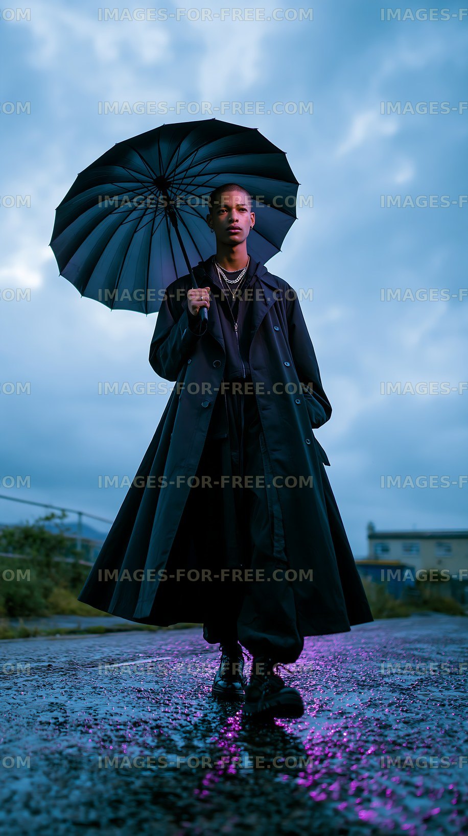 Man walking with black umbrella on a rainy street