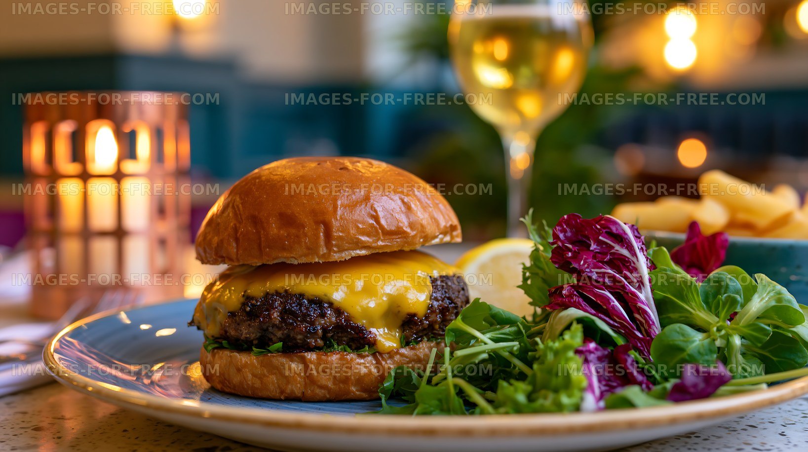 Delicious burger served with salad and fries in a restaurant