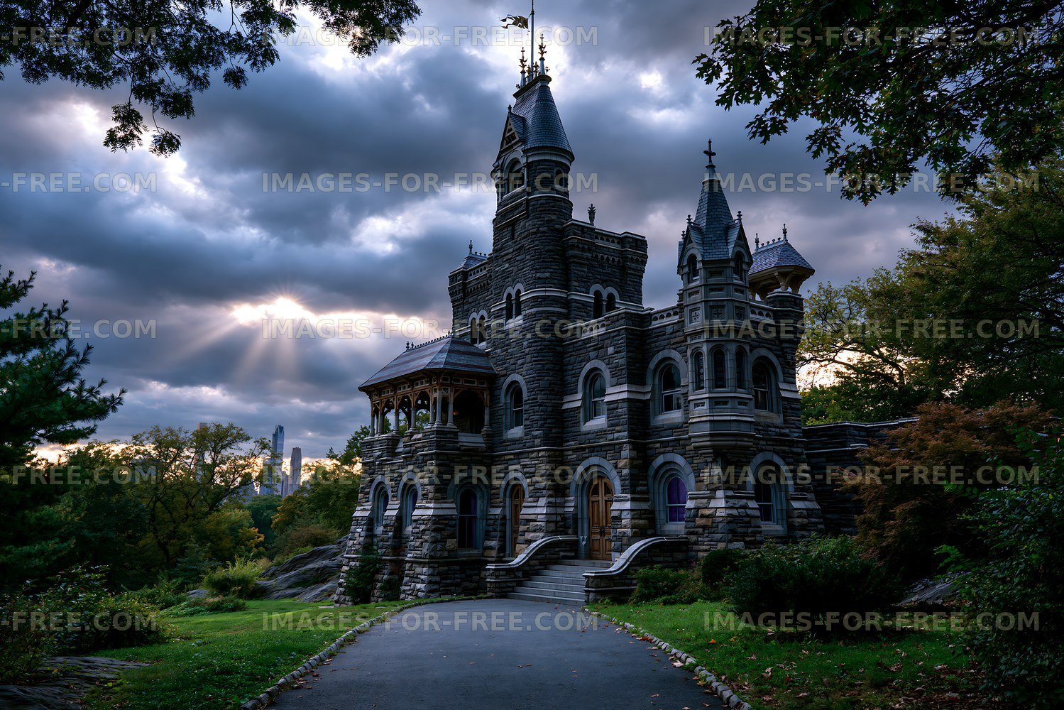 Historic castle stands in a park under dramatic clouds in the evening