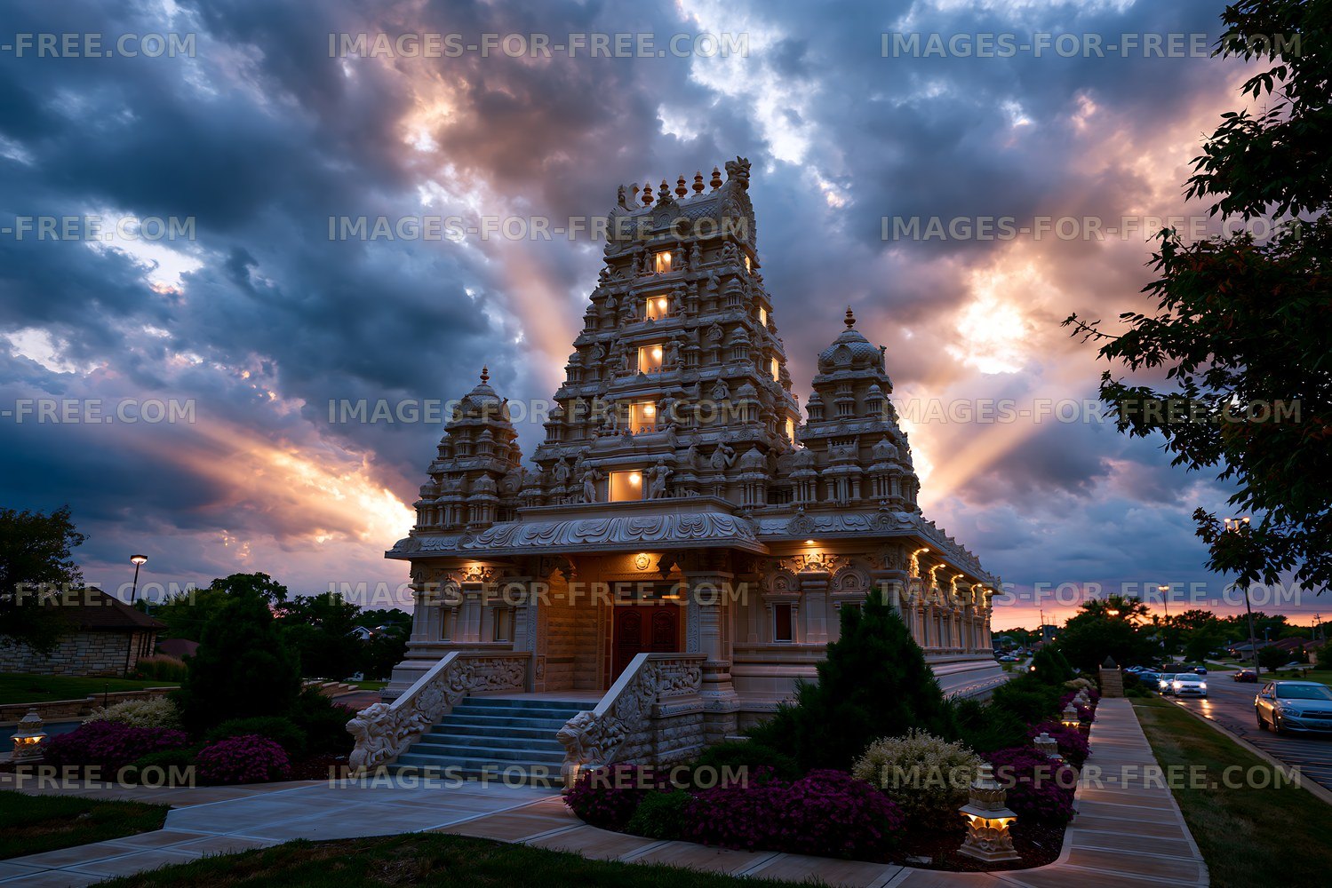 Sunset view of a Hindu temple with clouds in the evening sky
