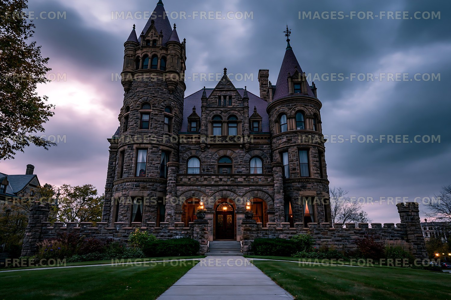 Historic stone castle with tall towers and dark sky