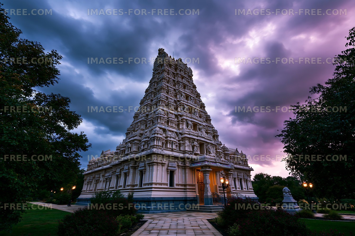 Historic temple with tall structure under dramatic sky
