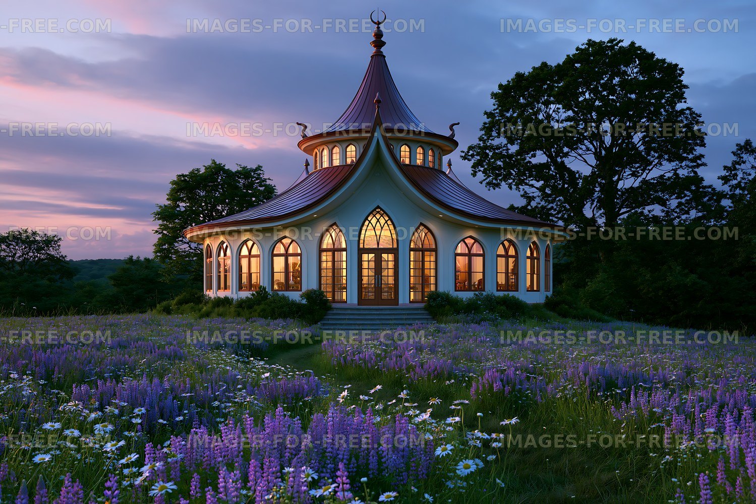 Beautiful building surrounded by flowers at sunset