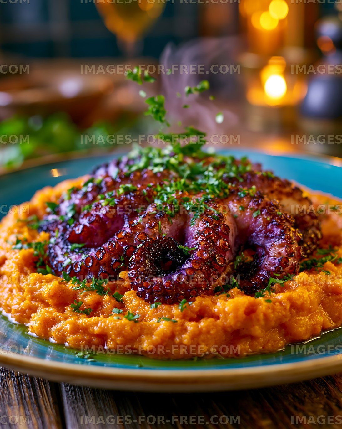 Octopus served on a bed of creamy mash at a restaurant in the evening