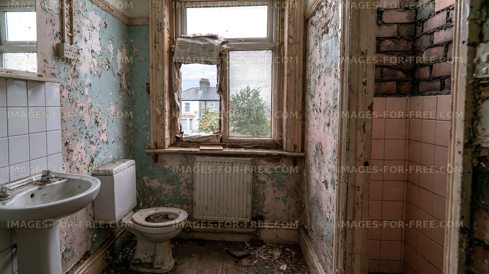 Old abandoned bathroom with peeling walls and broken fixtures