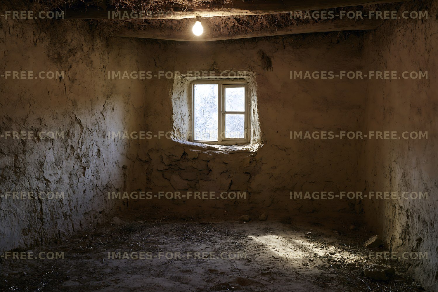 Interior of a rustic room with clay walls and a single window