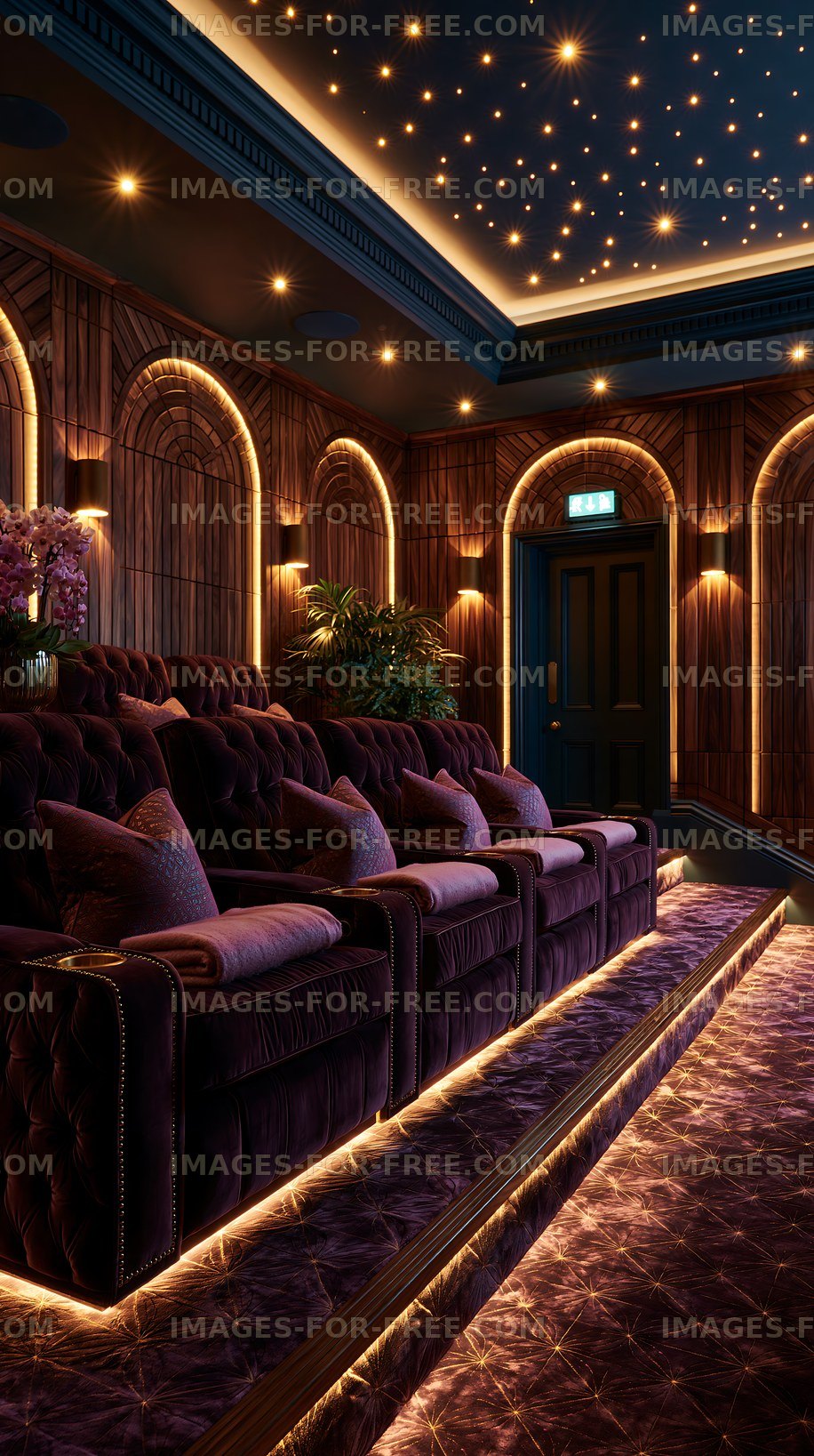 Home theater seating area with ambient lighting and wood paneling