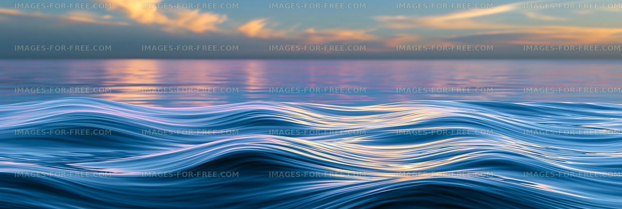 Waves gently moving under a colorful sky at sunset