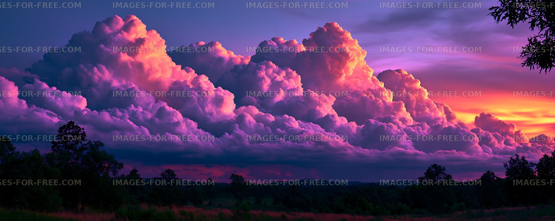 Colorful clouds at sunset over a rural landscape