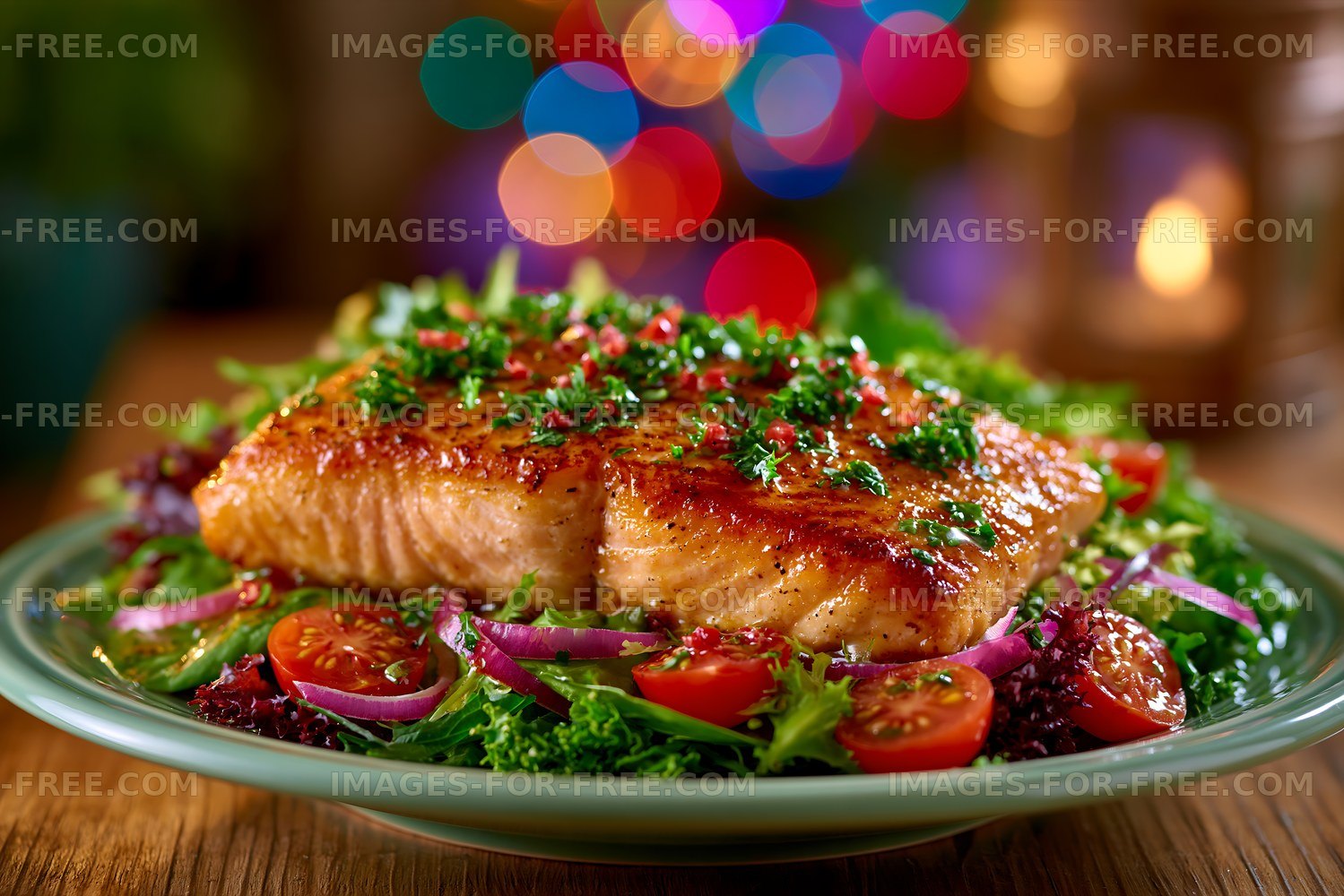 Grilled salmon on salad with colorful lights in background