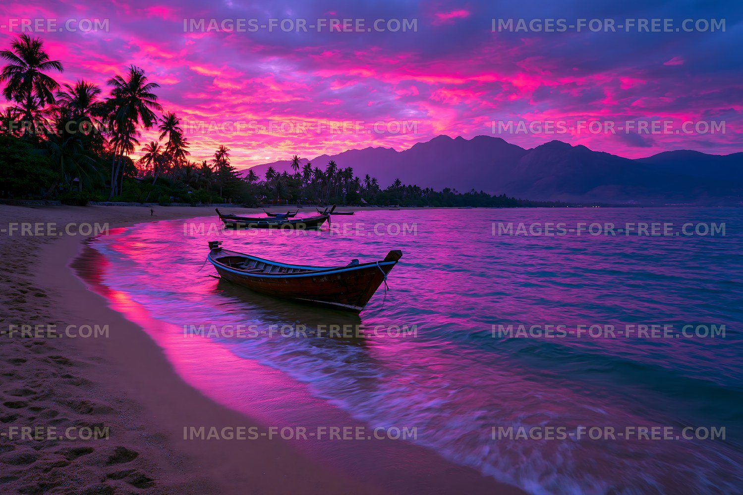 Sunset over the beach with boats and mountains in the background
