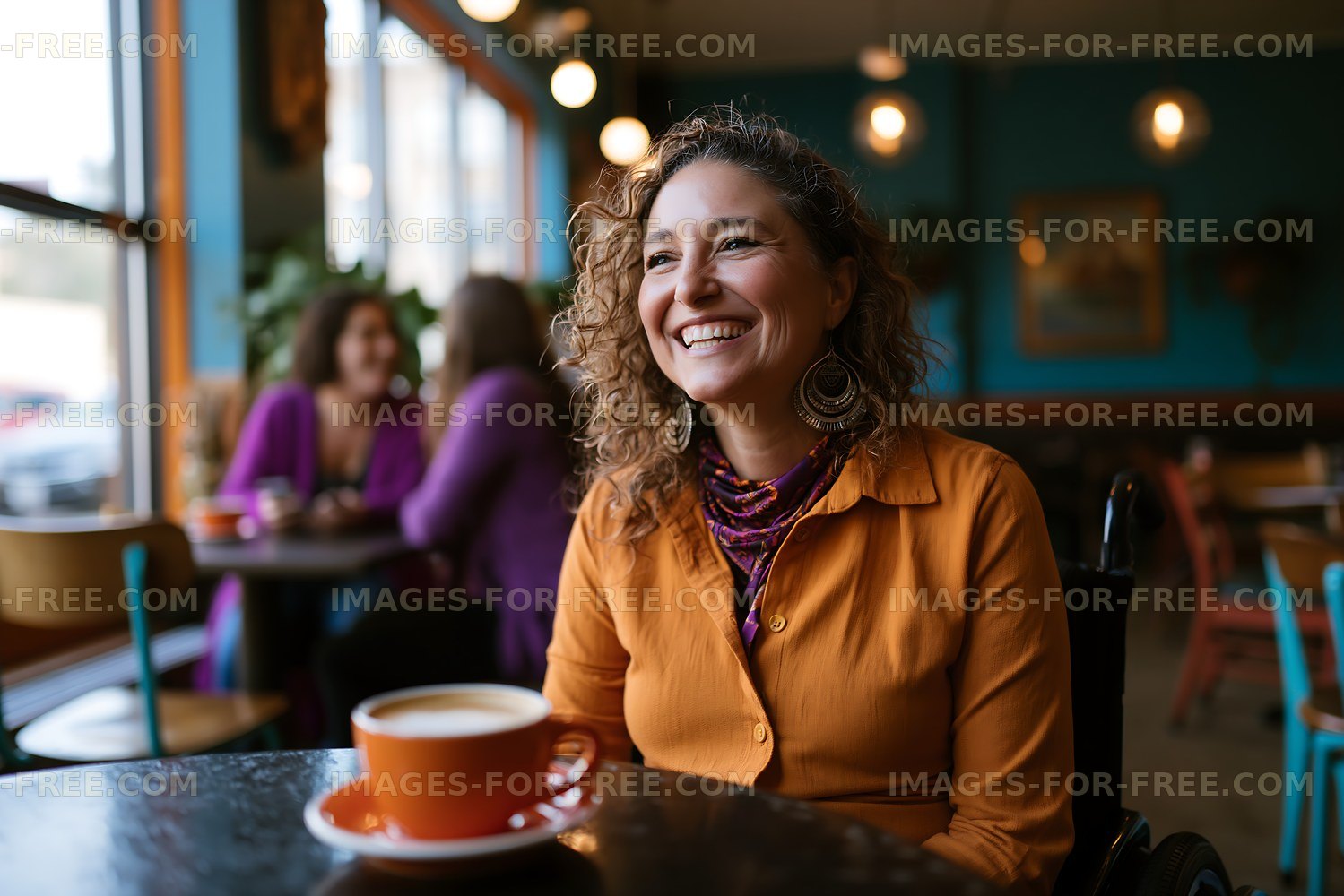 Woman in orange shirt smiles while sitting in a cafe with friends