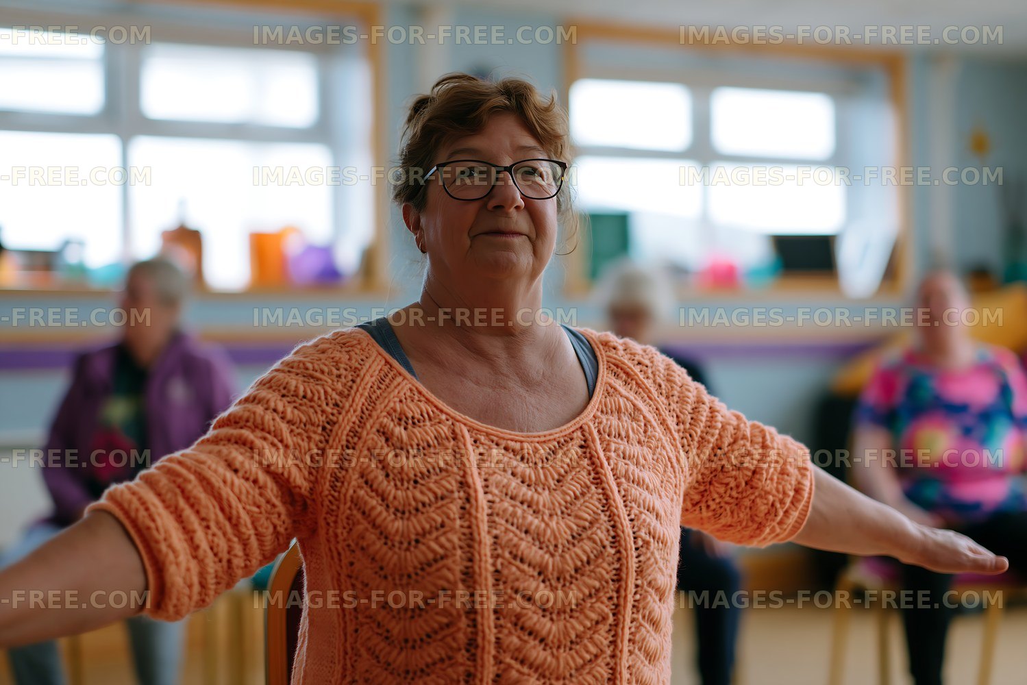 Senior woman in a lively group exercise session
