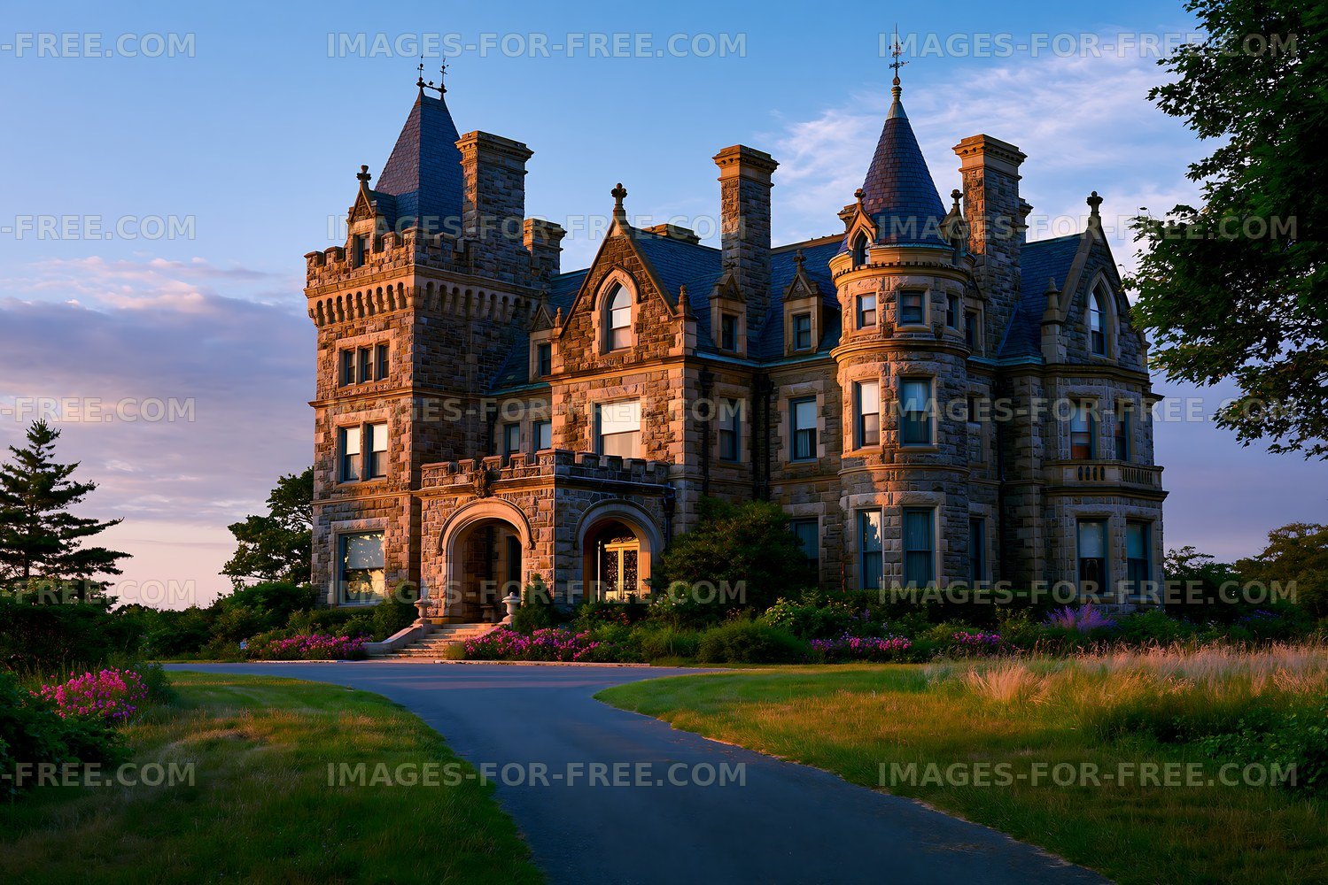 Historic castle with tower and stone architecture at sunset