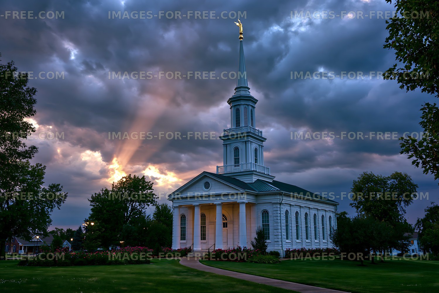 Church building under cloudy sky with rays of sunlight