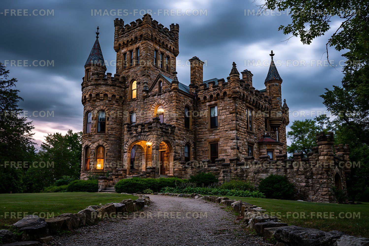 Historic stone castle under a cloudy sky during twilight
