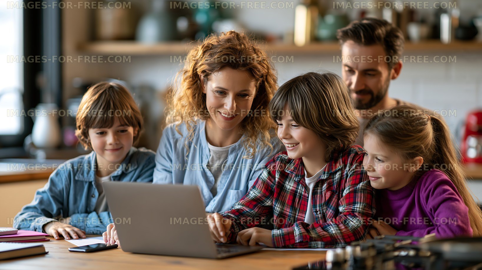 Family engages with laptop at home in a kitchen setting