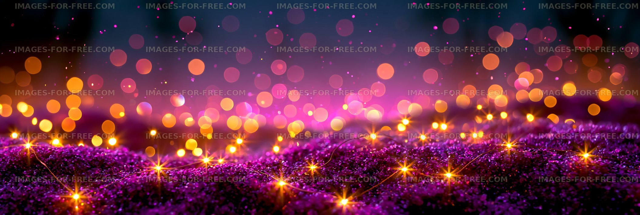 Colorful lights create patterns on a purple surface at night