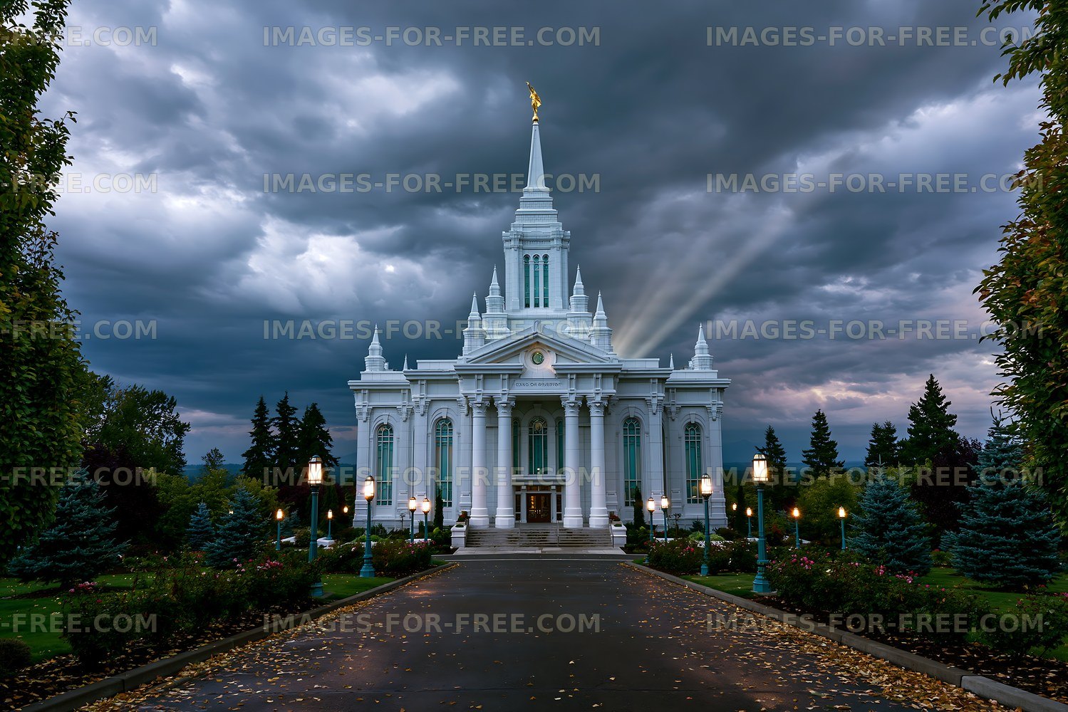 White temple under dark clouds with trees and path