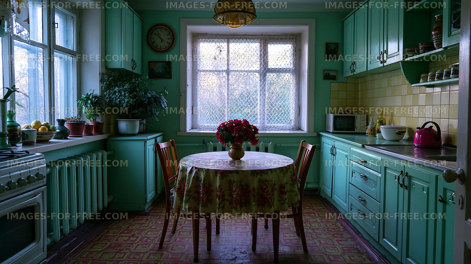 Old kitchen with green cabinets and a round table