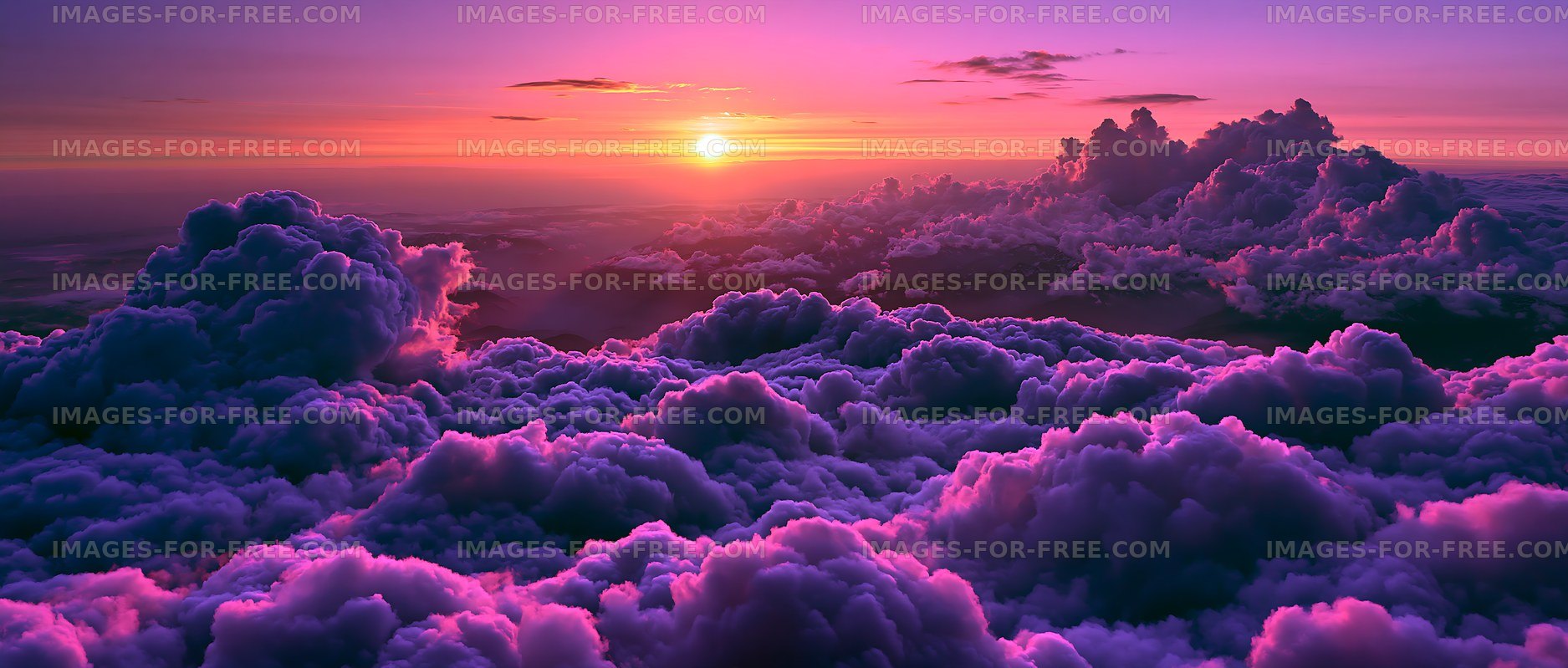Sunset over clouds with purple and orange hues