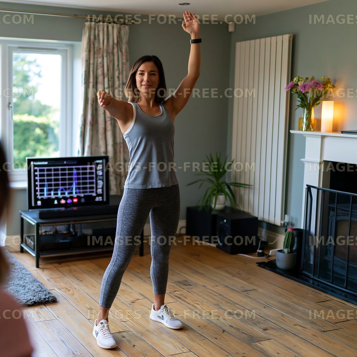 Woman exercising at home in a living room